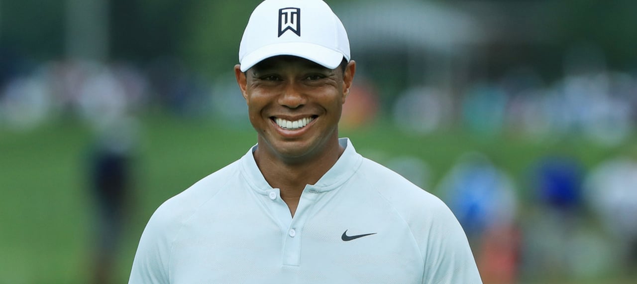 tiger-woods-smiling-golf tiger-woods-smiling-golf
