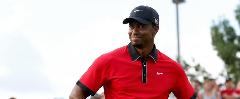 Tiger Woods feiert seinen Sieg mit Sohn Charlie