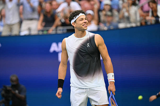 Ben Shelton celebrates after winning the third set against Alexander Zverev.