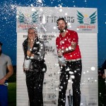 Lara Lehnstaedt und Anton Kirstein feiern ihren Sieg bei der German Long Drive Championship mit einer ordentlichen Champagnerdusche. (Foto: DGS)