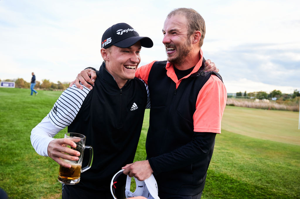 TARRAGONA, SPAIN - NOVEMBER 20: Rasmus Hojgaard of Denmark (L) and Benjamin Poke of Denmark (R) celebrates after both qualify on to the European Tour during day six of the European Tour Qualifying School Final Stage at Lumine Lakes Golf Course on November 20, 2019 in Tarragona, Spain. (Photo by Aitor Alcalde/Getty Images)